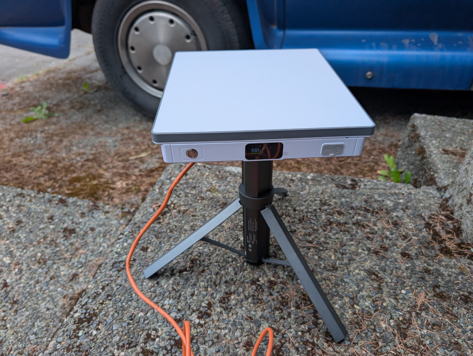Starlink Mini on the Orbynexa tripod in a real outdoor setup near a vehicle