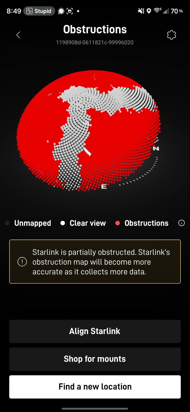 Starlink app obstruction map showing mostly red blocked sky with a white ribbon of clear view